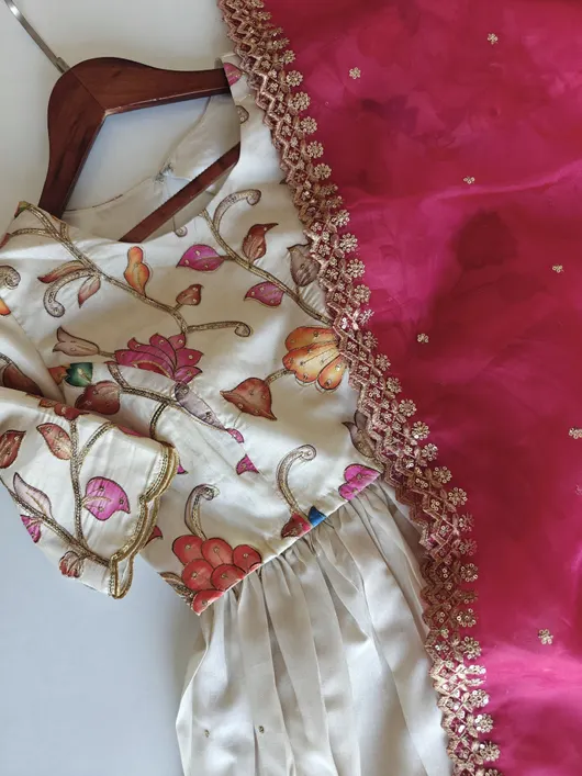 Premium Pure Tussar Silk Lehenga with a stunning combination of position printing and intricate embroidery all over.